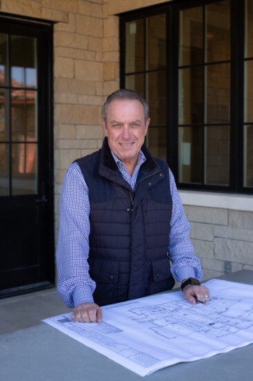 Nick looking over plans on site. 