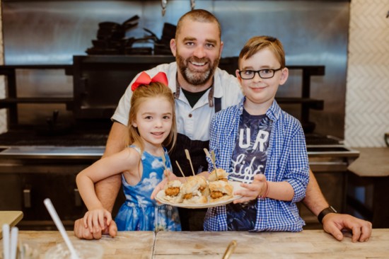 Chef Bobby Matos cooks up his famous Honey Butter Chicken Biscuits with his mini chefs, Brody and Bailey. 