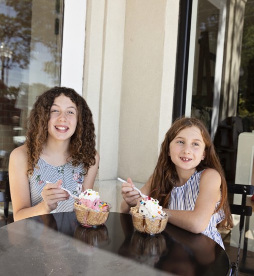 Ava and Brooke Colella enjoy a sweet treat