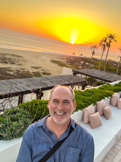 Sunset on the Pacific; one happy traveler
