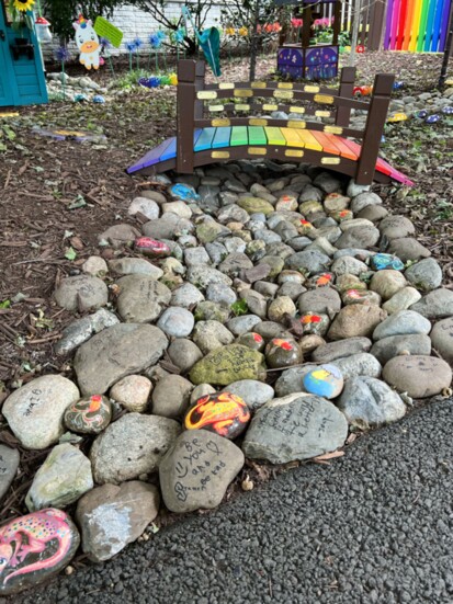 Spotting a painted stone brings a moment of delight and inspiration for many in the neighborhood. Credit: The Kindness Rocks Project (Va.)