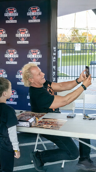 Jeff takes a selfie with a young fan during the Hendersonville Pig Fest All-Star Super Slam in October 2025.