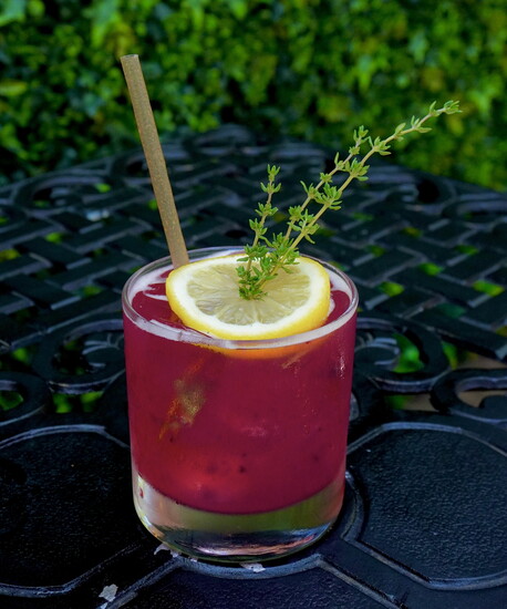 The Slappin da Bass cocktail is made with Grey Goose, blackberries, thyme-infused syrup, lemon juice and soda.