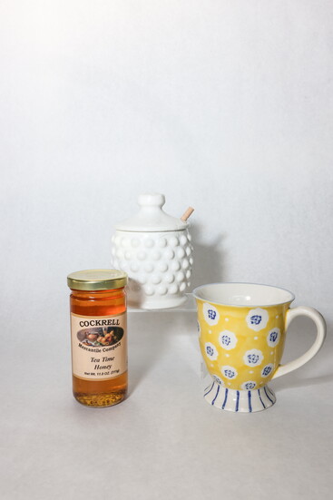 Coffee and tea accessories including Cockrell brand honey