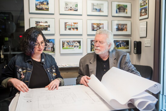 Aaron Michelle and Robert Platt go through plans for their latest project.