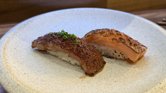 The A5 Wagyu & Saketoro Aburi, hand-torched Big Glory Bay King Salmon.