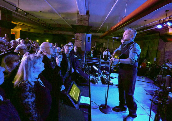 John Mellencamp performing at a Kristen Ann Carr event