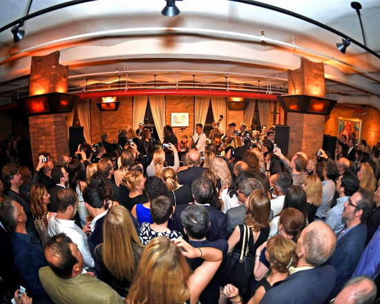 The crowd grooving to a performance at the Night to Remember event