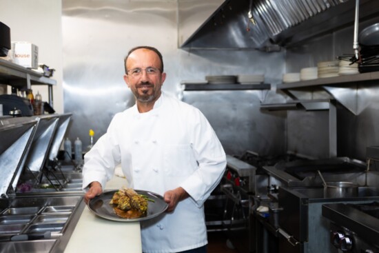 Hasan's signature pistachio crusted lamb with fig sauce and potatoes.