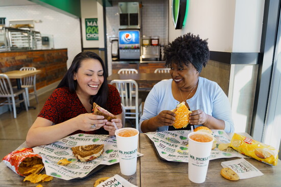 Enjoying a casual catch-up at Mr. Pickle's. Courtesy Mr. Pickle's