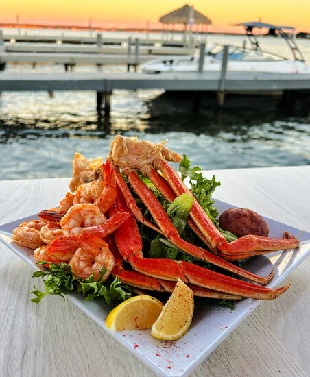 Thursday seafood boil served dockside with stunning Lake Conroe views.