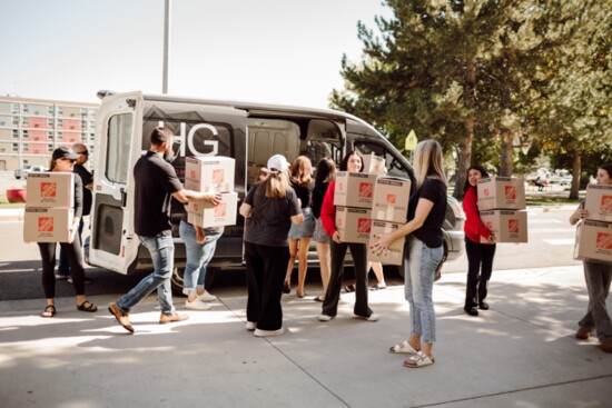 A team effort to drop off and unload donated meals.