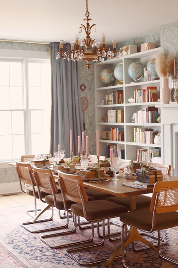 Dinner with a side of nostalgia—vintage globes, layered books, and crystal sparkle set the scene for memory-making.
