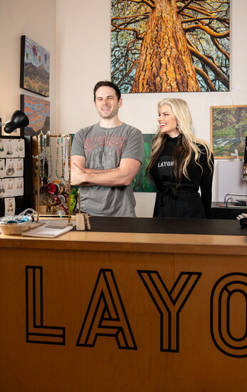 Bo Morris, art handler, and Lacey Champagne.