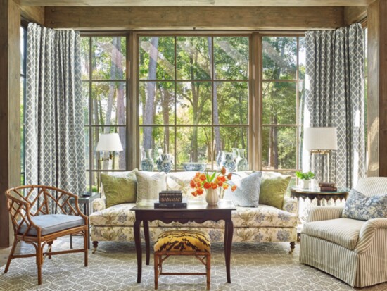 Cathy Chapman blended vintage, antique and new furnishings and accessories in this family room. Photo by Tria Giovan