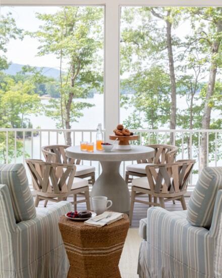 Richardson designed this home at Smith Mountain Lake in Virginia. Here, a balcony patio feels like part of a treehouse with a lake view. Photo by Gordon Greg 