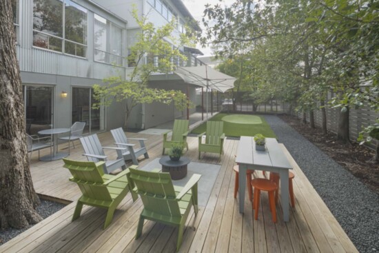 Architect Donna Kacmar designed new outdoor entertaining space for this home. Photo by Benjamin Hill