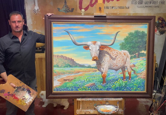 Casbeer shows painting of local Texas Longhorn. - Submitted photo