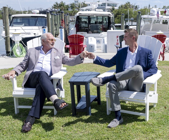 Boldt and Roberts engage in a friendly fist-bump while lounging at the Venice Yacht Club. (Photo by Brian Glantz-1st Glantz Media)