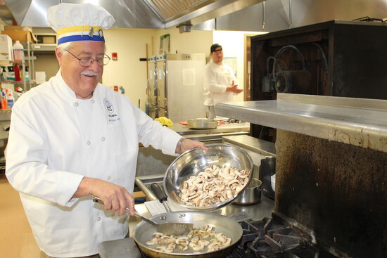 Marietta's Jim Taylor sautes mushrooms for rib main course
