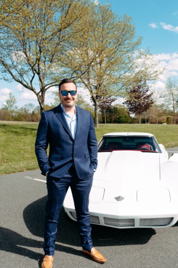 Jerry York poses with a 1978 Chevrolet Corvette Restomod owned by Michael J. Badolato, owner of Gallaway & Crane Funeral Home.