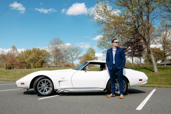 Jerry York poses with a 1978 Chevrolet Corvette Restomod owned by Michael J. Badolato, owner of Gallaway & Crane Funeral Home.