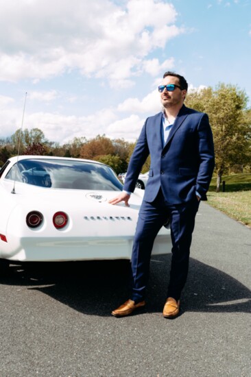 Jerry York poses with a 1978 Chevrolet Corvette Restomod owned by Michael J. Badolato, owner of Gallaway & Crane Funeral Home.