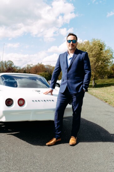 Jerry York poses with a 1978 Chevrolet Corvette Restomod owned by Michael J. Badolato, owner of Gallaway & Crane Funeral Home.