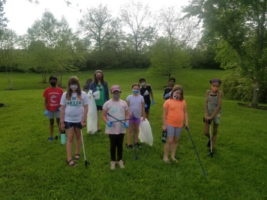 Students at the BRAVE Ambassadors end-of-year celebration at Pine Hill Lakes Park, where they cleaned up trash. 