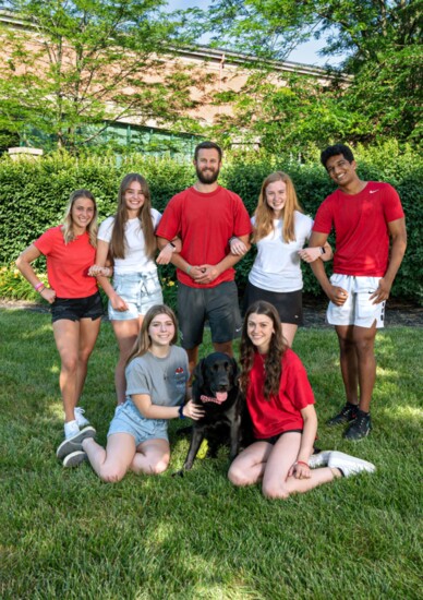 MHS Hope Squad returning members with Faculty Advisor, Alex Beurket and Therapy Dog, Hibbs. 