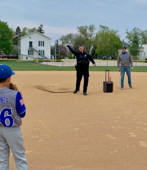 Ceremonial First Pitch, by Officer Andrew Heer.