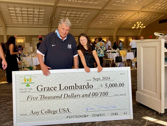 Grace Lombardo Receives Check from LTPF Founder Ken D'Andrea at 2024 Event