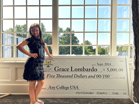Grace Lombardo and her Check for College.
