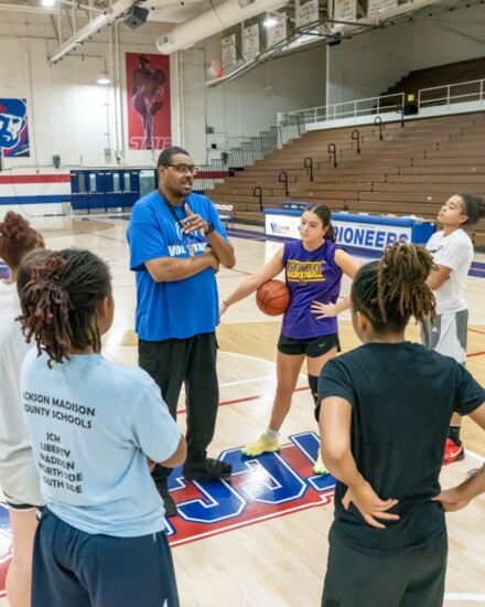 Coach Key goes over some game strategies during a practice session.