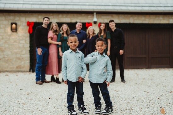 Ryker and Roman with their family, the Rays