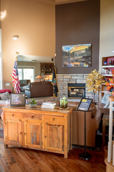 The welcoming living room at the CENTER provides a safe, home-like space for rest and relief.