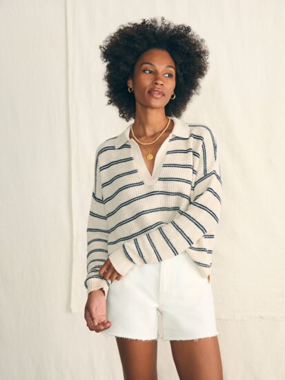 Warm enough for cool evenings but light enough for sunny days, this striped polo is knit in an airy linen cotton blend.