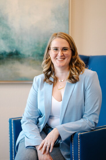 Soft, neutral colors are often the best choices for headshots. Don't worry if you wear glasses - there shouldn't be any glare.