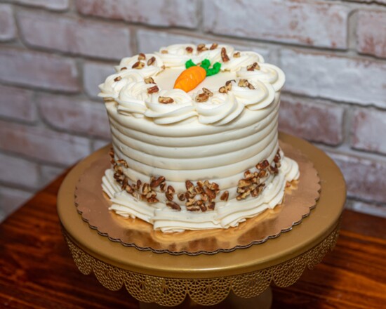 Cakes with seasonal decorations, such as the Easter-themed carrot cake, are popular bakery items.