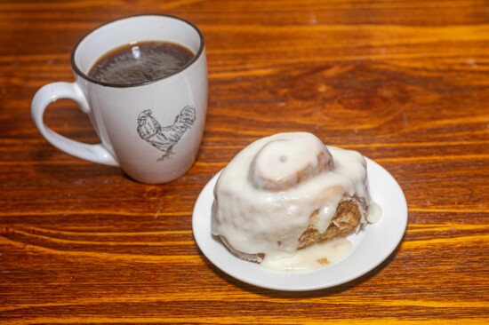 A fresh cinnamon roll and a hot cup of coffee is a popular order at Lili Bella's.