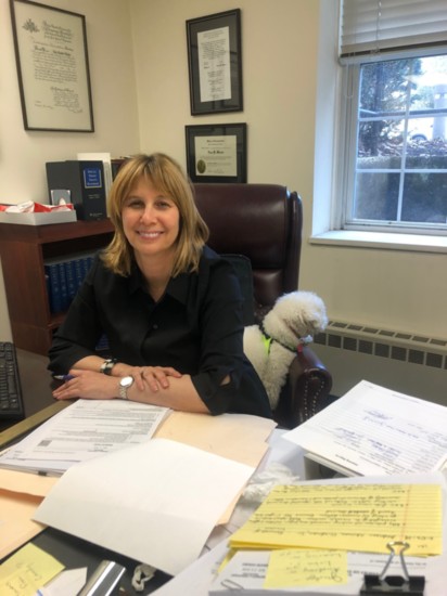 Lisa after a long day working in Town Hall, with her dog Salt.