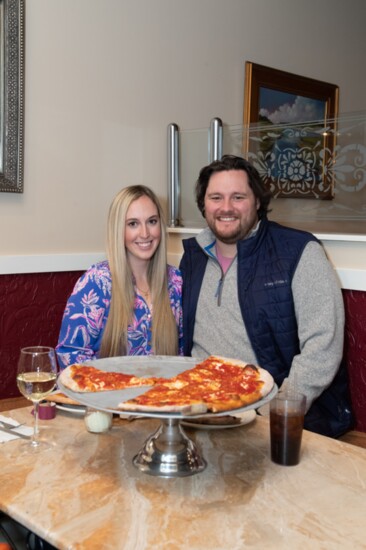 To celebrate their first date Maura Yellen and Matthew Biekert share a pizza every Dec. 20th at Luna in Glastonbury. 