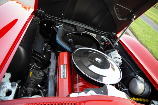 Artistic iron - the 327 cubic inch Chevy block is nestled in the engine compartment of the 1963 Corvette C2.