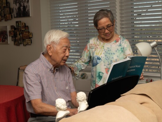 Residents at Wesley Glen play the piano.