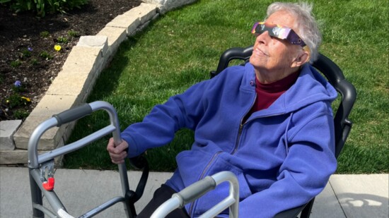 Peggy Keener soaks up the sunshine outside of Wesley Glen