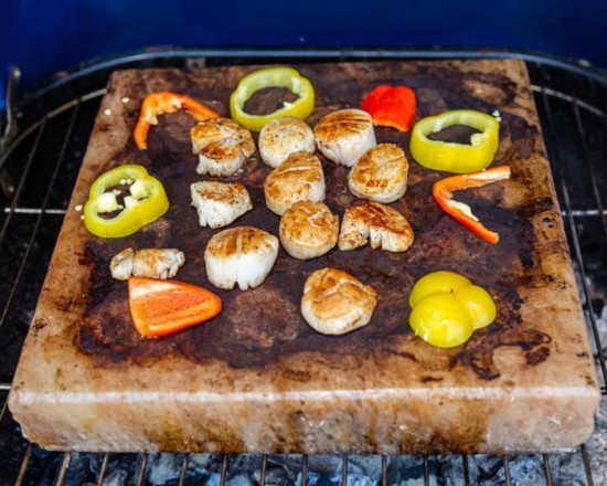 Salt block scallops with grilled peppers