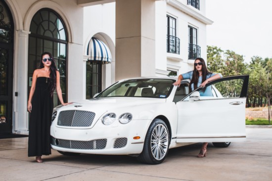 Arriving in style. Morgan Maness (left) is wearing a black jumper from Hello Daffodil, and her sister Lauren is wearing a blue dress from Briesly's Boutique. 