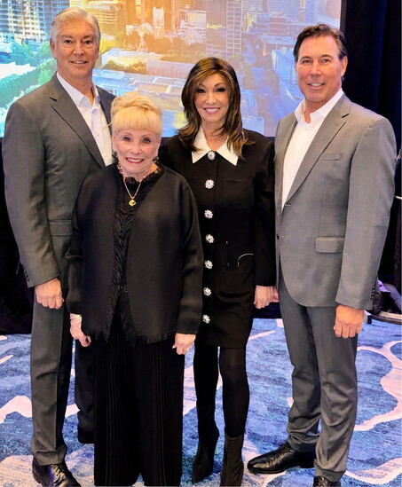 The Estate Properties leadership team: John Sanders (CTO), Diane Sanders (CMO), and James Sanders (CEO), with their mother and company founder, Sandra Sanders.