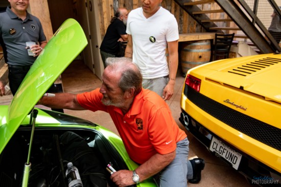 Valentino Balboni autographing hood