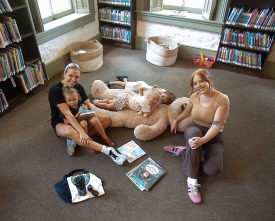 Michele Papan and Bella Kirchoff gather for some mom time with their children Dorothy (on lap), Mary, and Sage